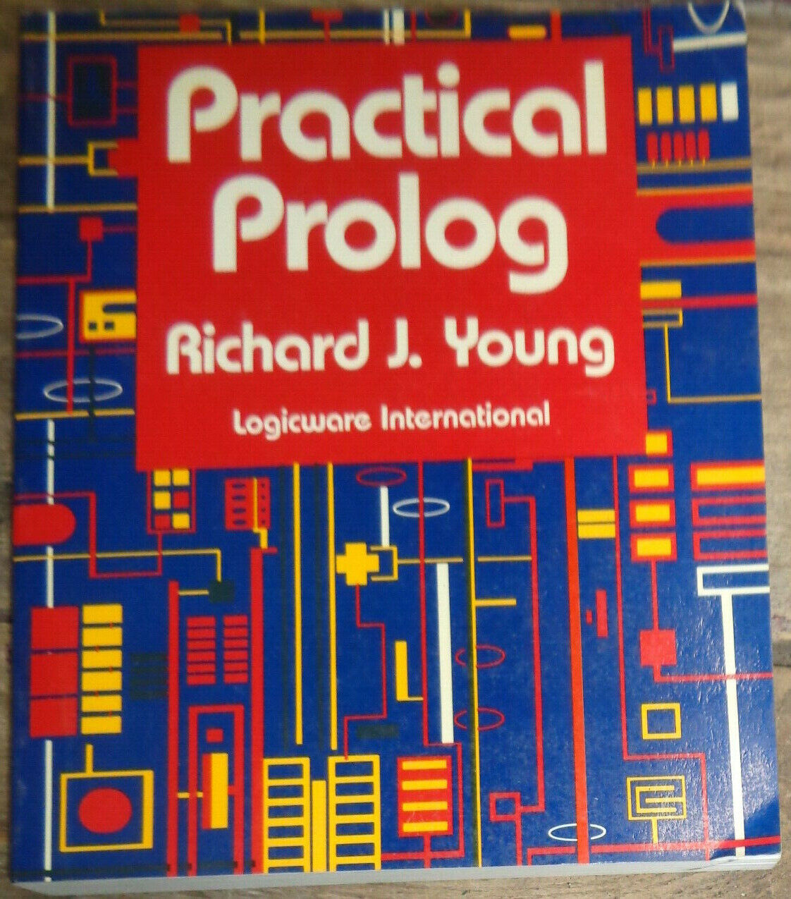 Practical PROLOG, by Richard J Young. 1989 First edition.