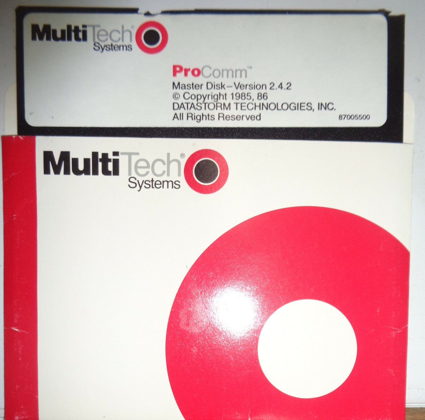 ProComm Software (manual & disk) + MultiModem Manual 1988 by Multi-Tech Systems