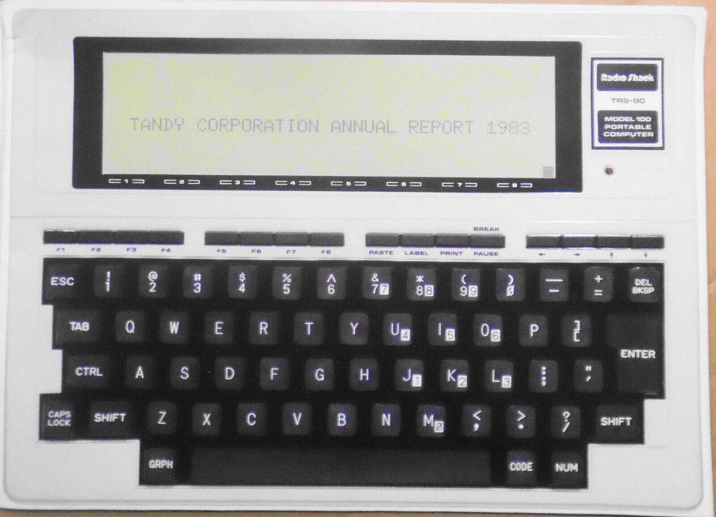 [Radio Shack] Tandy Corporation Annual Report 1983 with embossed Model 100 cover