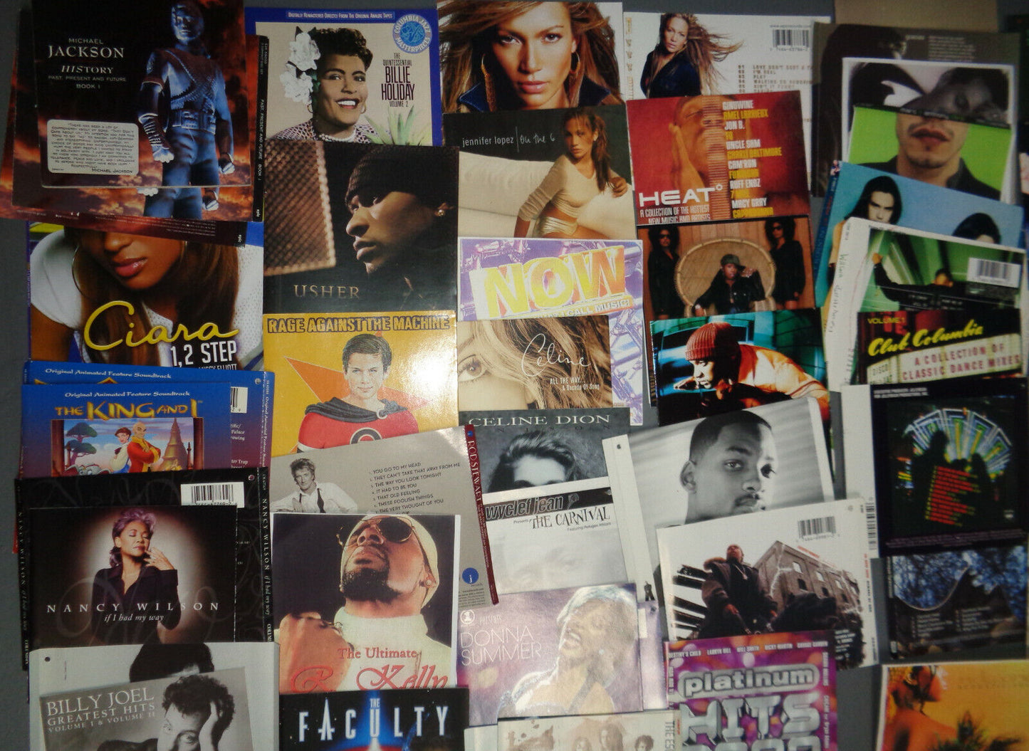 300 CD inserts, booklets - R&B, latin, rock, pop, jazz, etc.