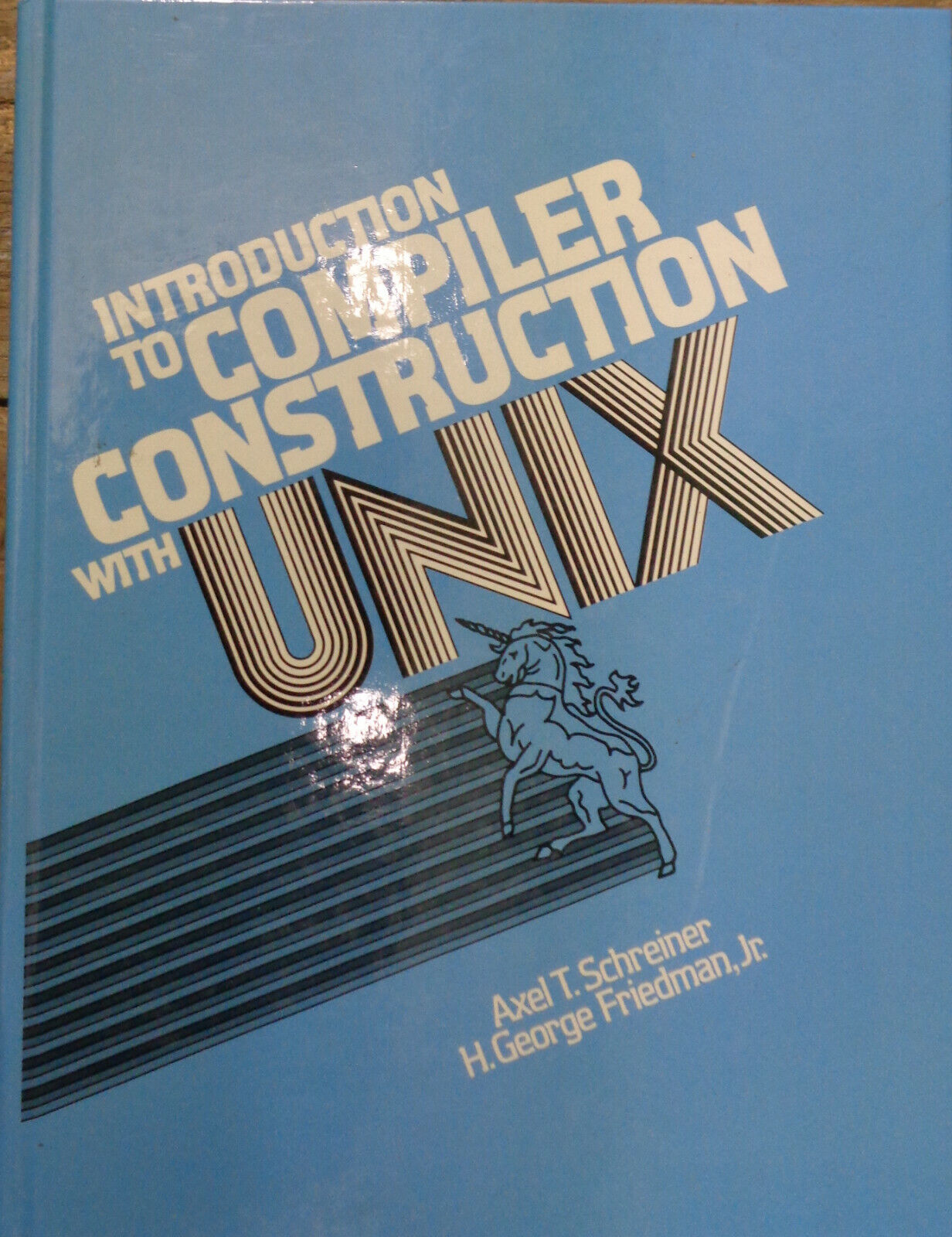 INTRODUCTION TO COMPILER CONSTRUCTION WITH UNIX By Axel T. Schreiner & H. George