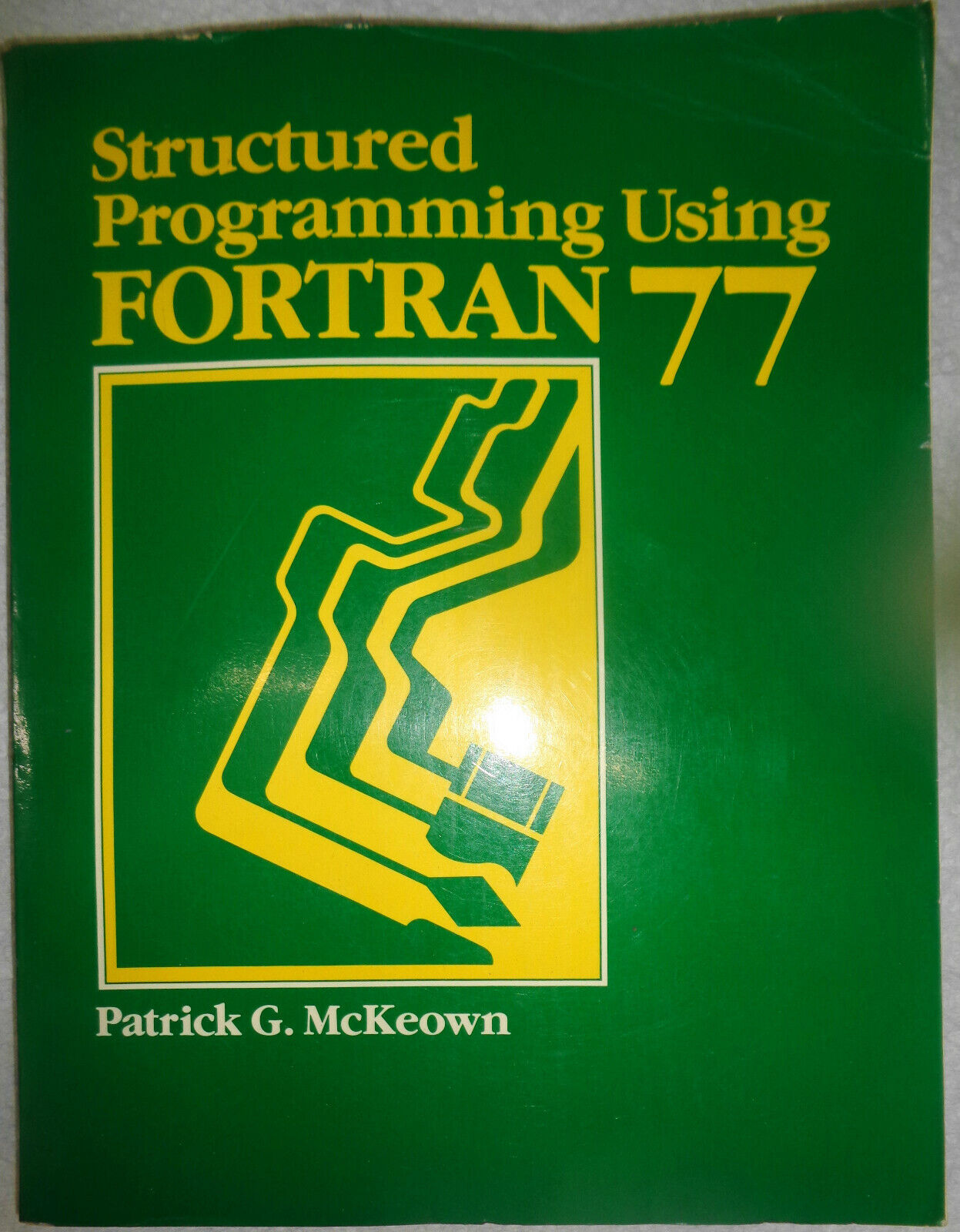 Structured programming using FORTRAN 77, by Patrick G McKeown. 1985.