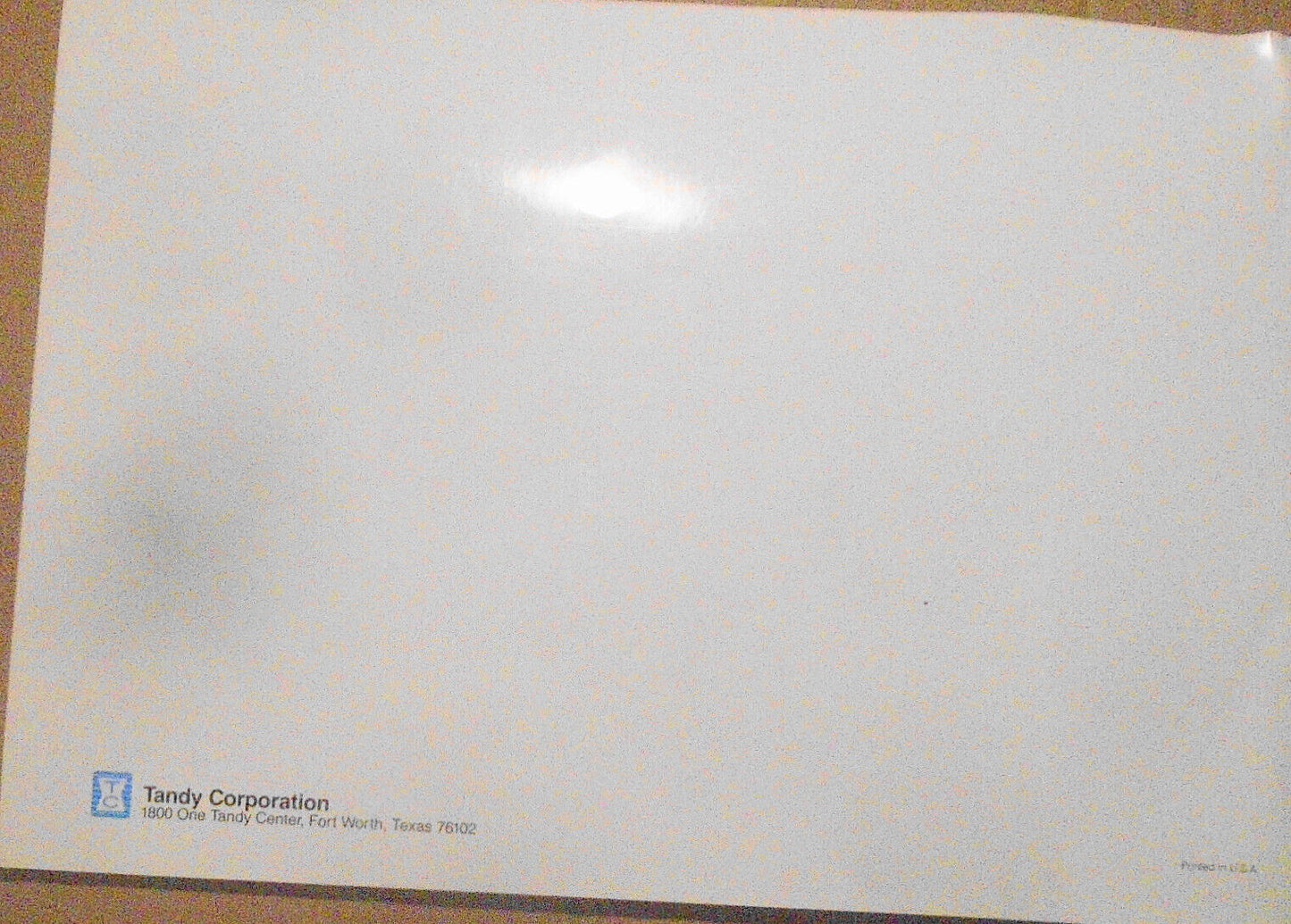 [Radio Shack] Tandy Corporation Annual Report 1983 with embossed Model 100 cover