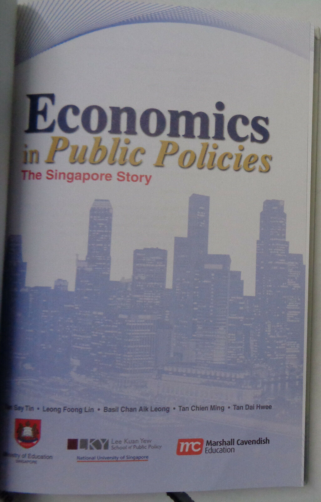 Economics in public policies : the Singapore story, by Say Tin Tan, et al