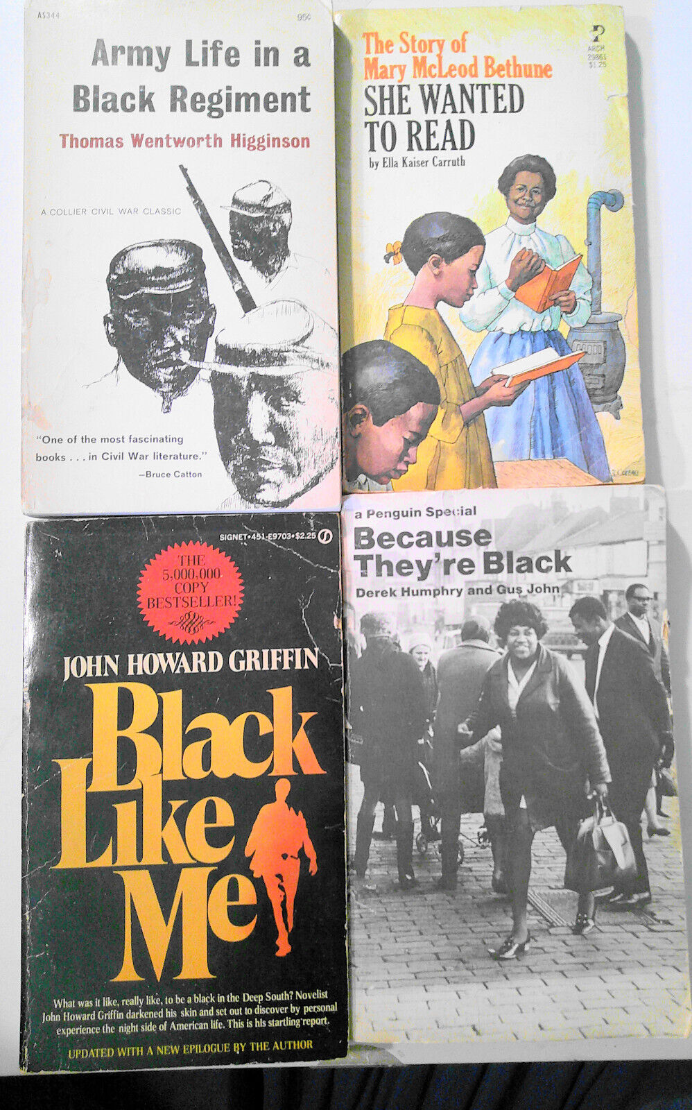 4 vintage African American history paperback books.