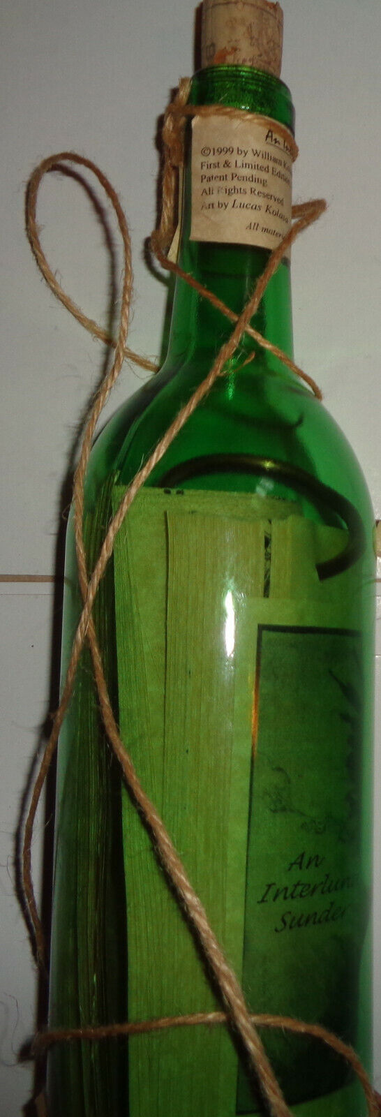 An Interlunar Sunder [Book bound in bottle] by William Kolasa. Ltd Edition, 1999