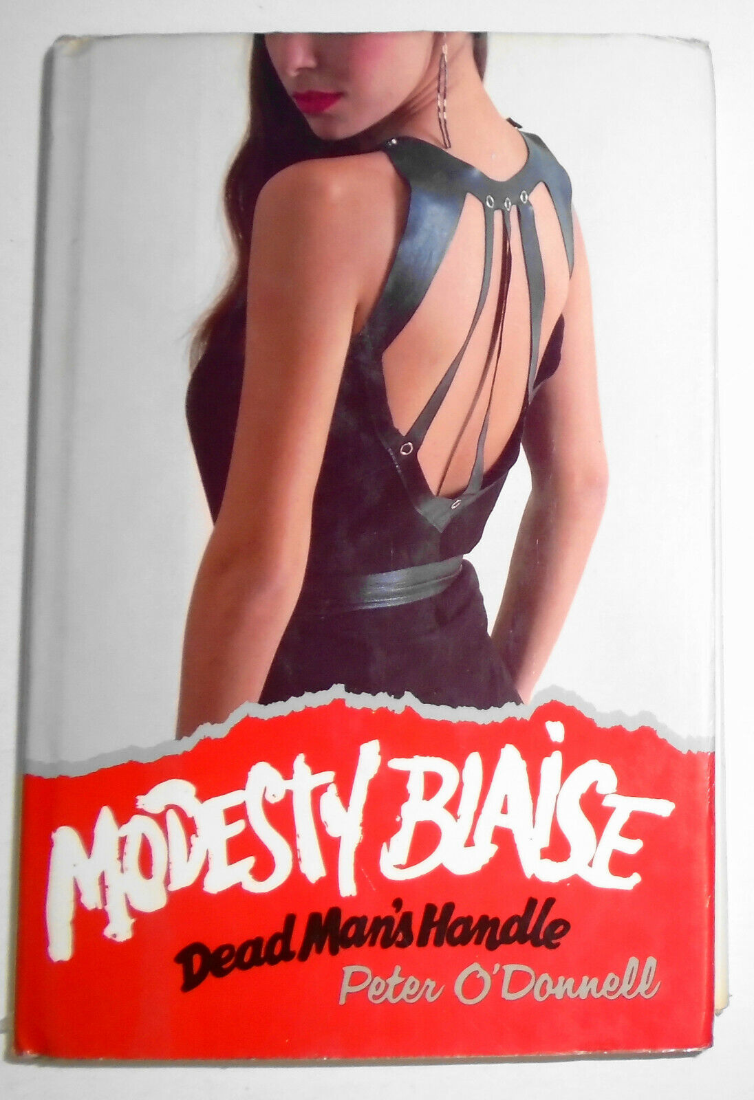 Modesty Blaise. Dead man's handle, by Peter O'Donnell. 1986 First edition.