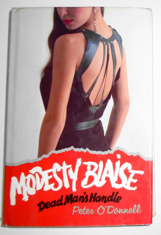 Modesty Blaise. Dead man's handle, by Peter O'Donnell. 1986 First edition.